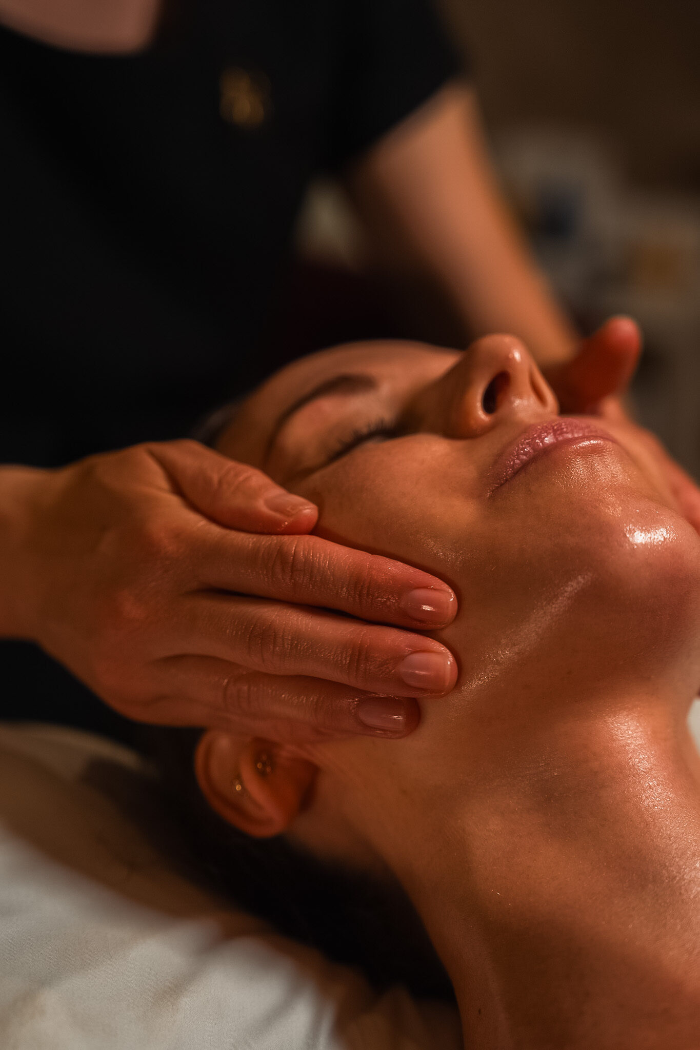 Guest receiving a facial massage