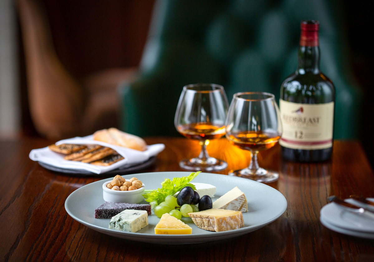 Selective cheese and whiskey tasting in the whiskey room.