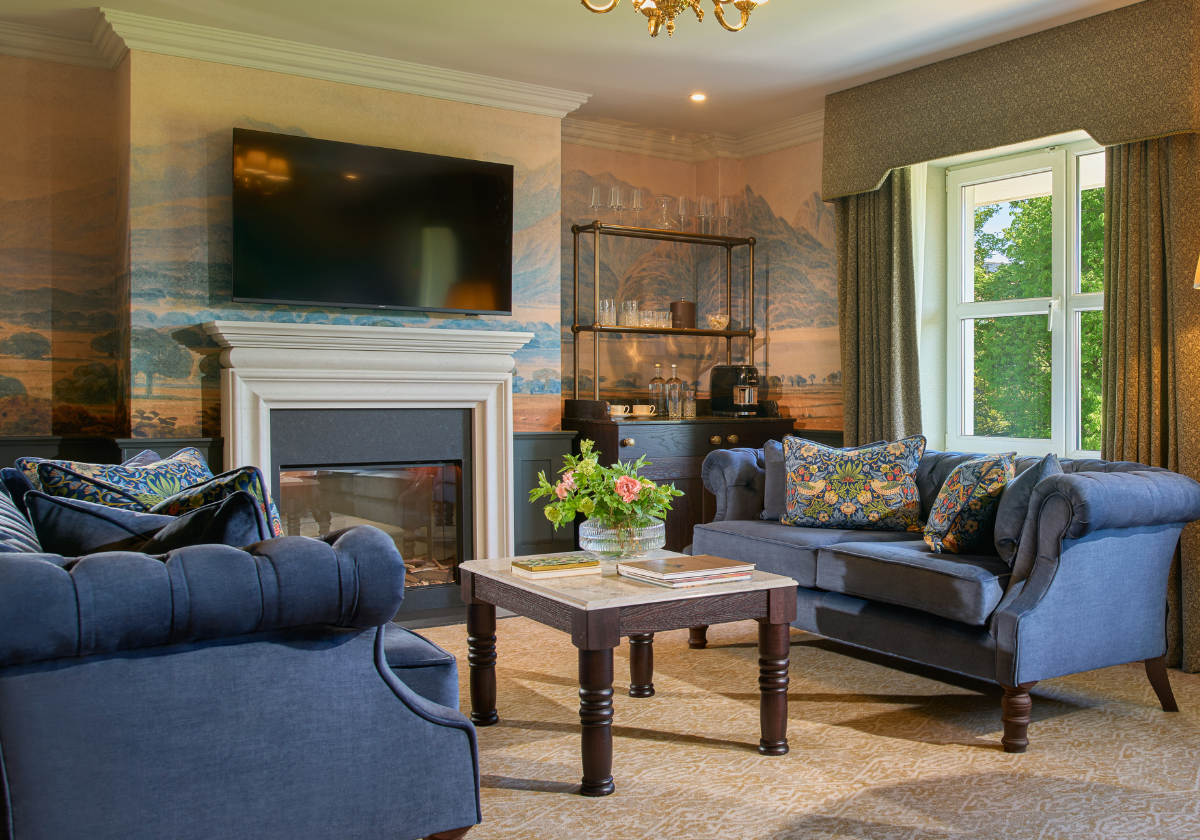 This is the living space by the fireplace in The Muckross Suite.