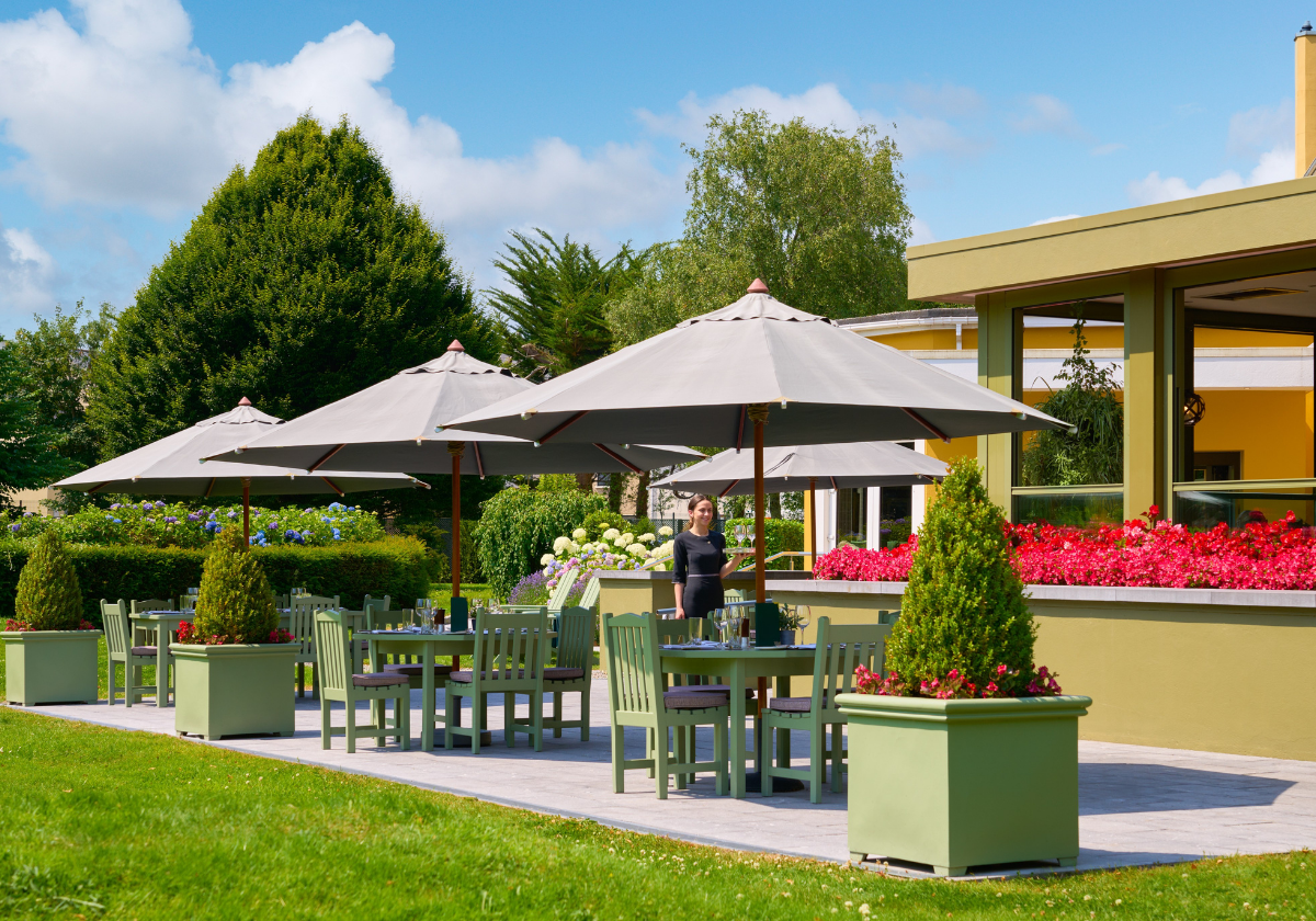 Outdoor Terrace Dining Area with sun umbrellas.