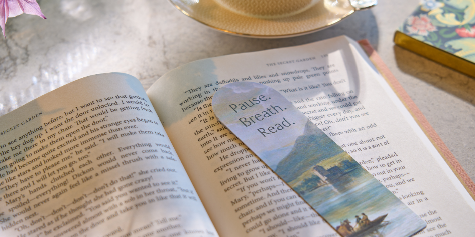 A guest reading a book with the afternoon tea