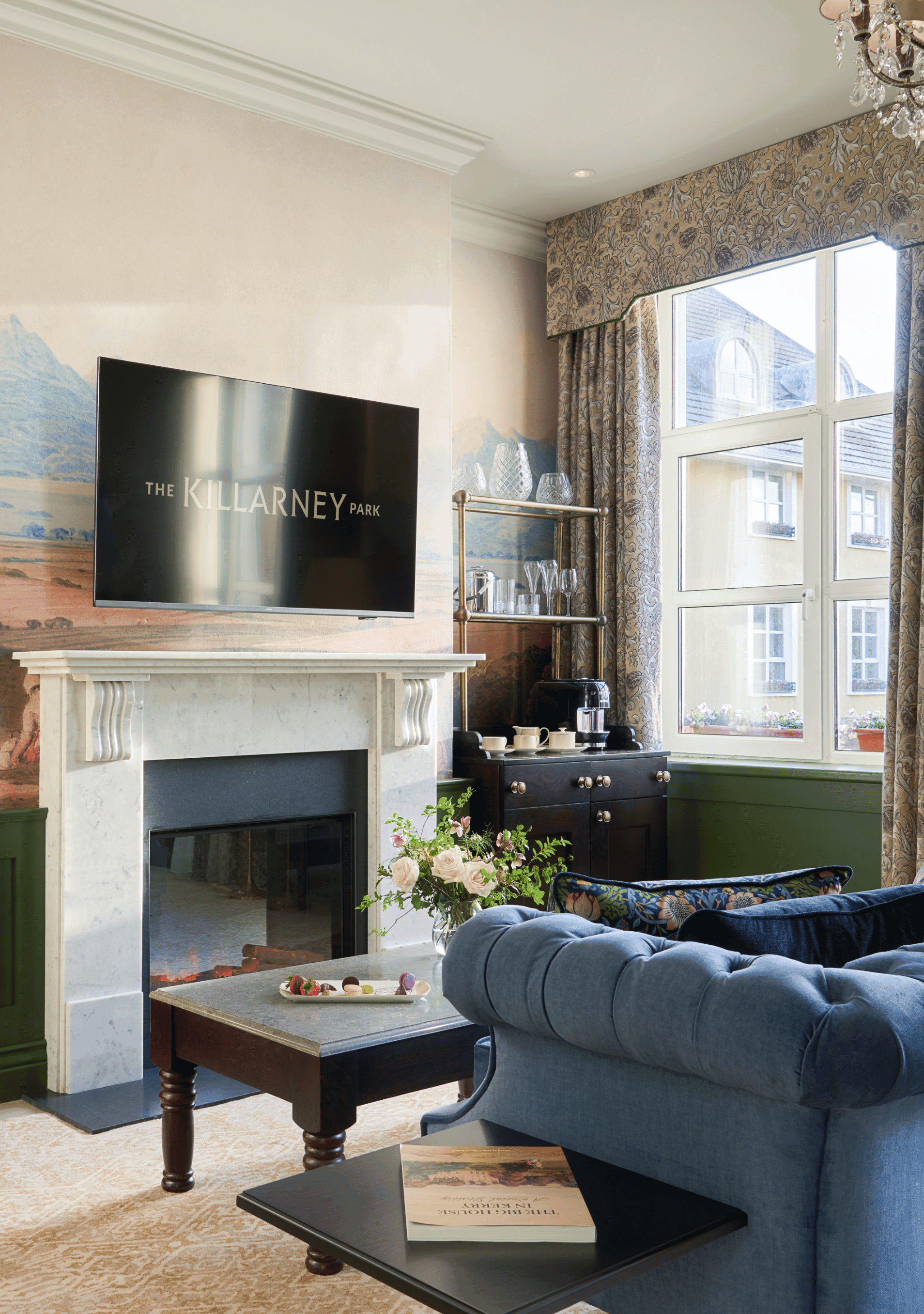 Signature Suite- Sitting area by the fireplace.