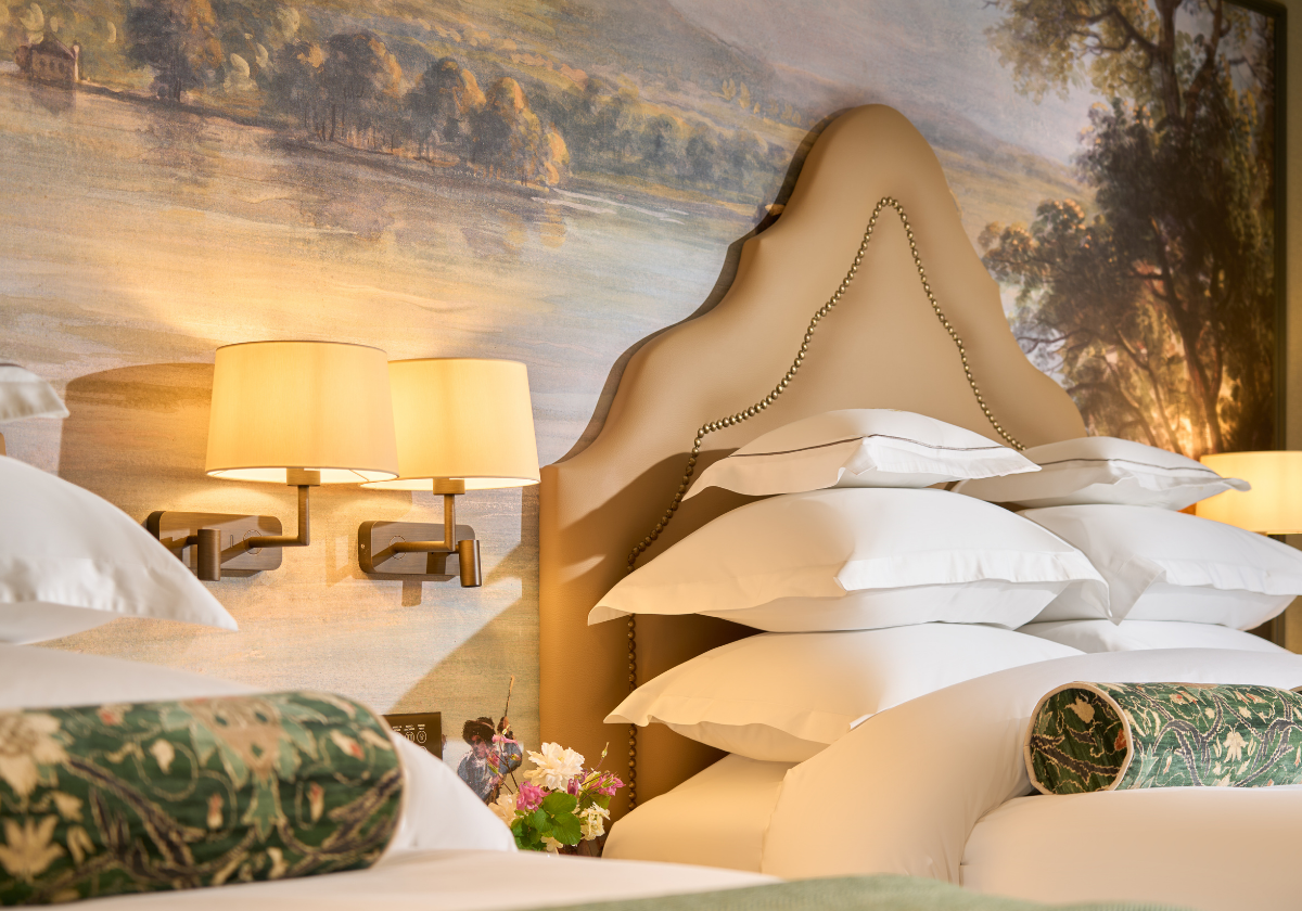 A stack of comfortable pillows on the king bed.